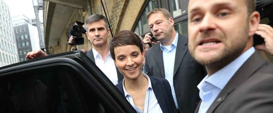 Frauke Petry, a leading member of the right-wing Alternative for Germany (AfD), walks to a waiting car.