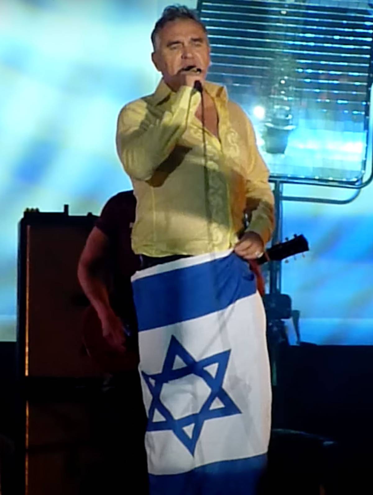 Morrissey wears an Israeli flag during a 2012 show