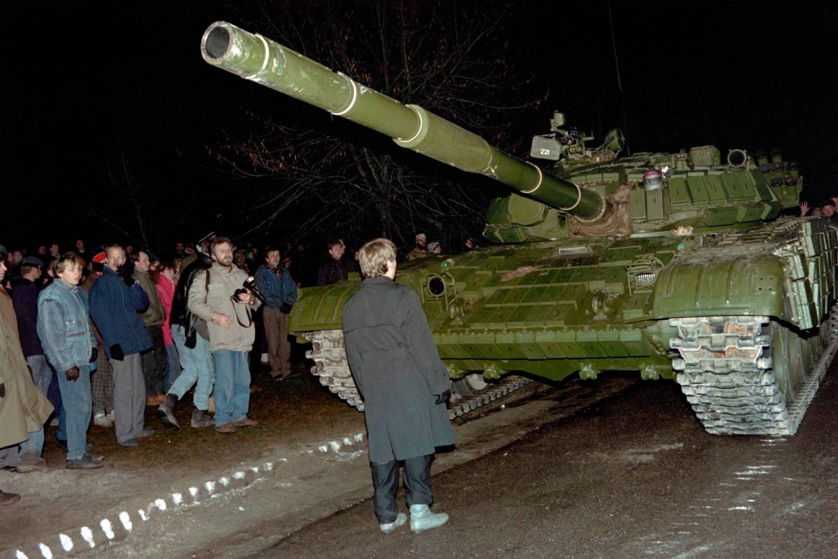 A Lithuanian demonstrator stands in front of a Soviet Red Army tank during the assault on the Lithuanian Radio and Television station in Vilnius on Jan. 13, 1991. Soviet troops opened fire on unarmed civilians in Vilnius, killing 13 people and injuring 145 others.