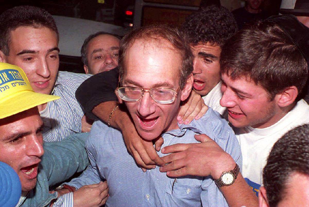 Ehud Olmert is congratulated after being elected mayor of Jerusalem on Nov. 2, 1993. Olmert beat Labor candidate Teddy Kollek, 83, who had been mayor for the previous 28 years.(Yoav Lemmer/AFP/Getty Images)