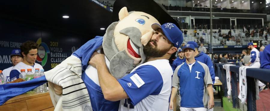 nfielder Cody Decker #14 of Israel holds team mascot The Mensch after the World Baseball Classic Pool A Game Five between Netherlands and Israel at Gocheok Sky Dome in Seoul, South Korea, March 9, 2017. 