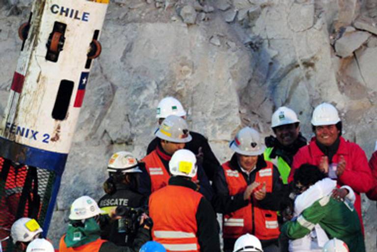 They are rescuing miners.(Martin Bernetti/AFP/Getty Images)