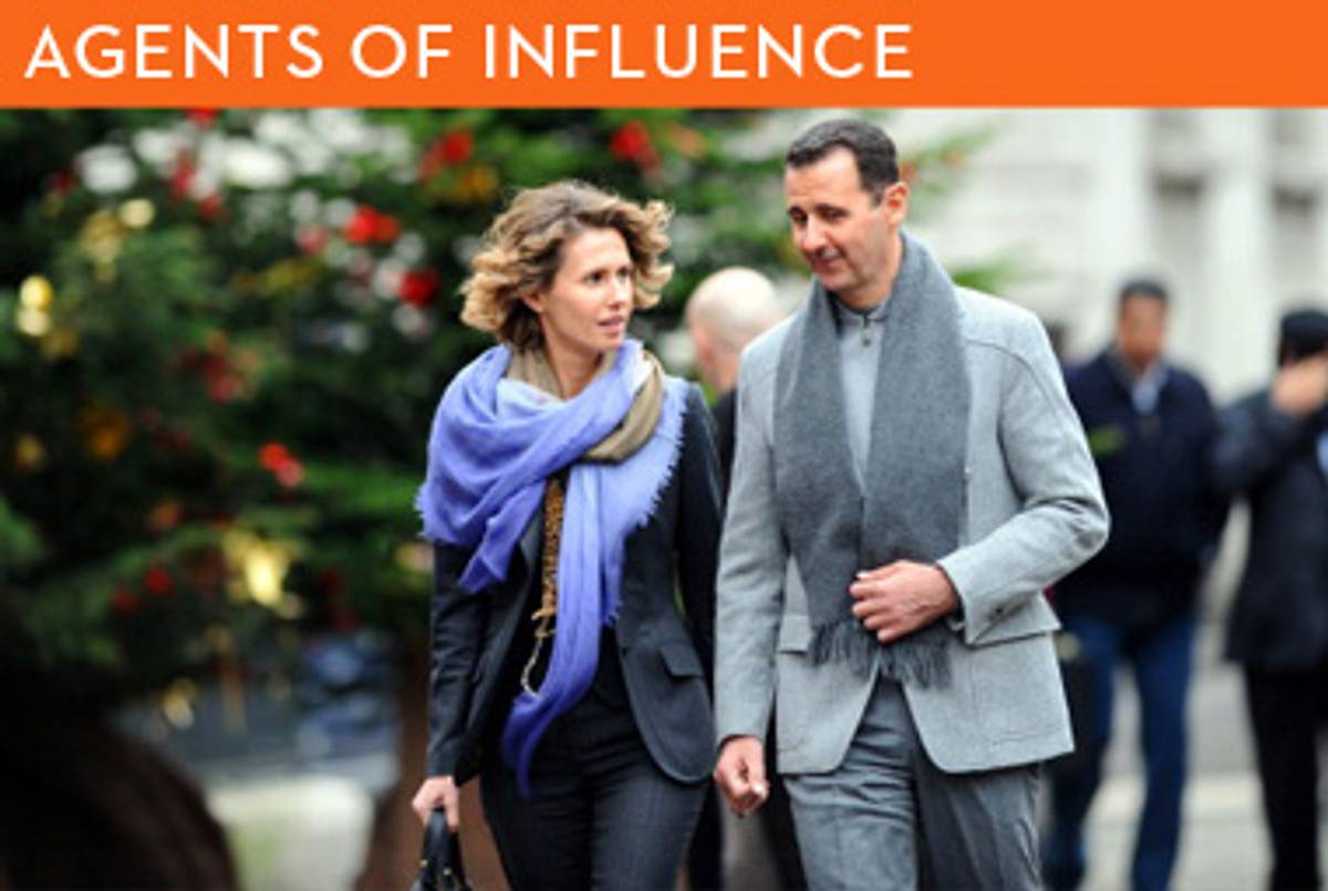 Bashar al-Assad and his wife, Asma, visiting Paris in December.(Miguel Medina/AFP/Getty Images)