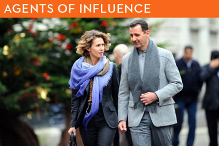 Bashar al-Assad and his wife, Asma, visiting Paris in December.(Miguel Medina/AFP/Getty Images)