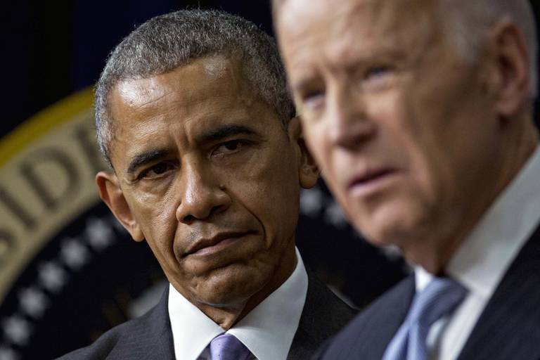 President Barack Obama listens to Vice President Joe Biden in Washington, D.C., on Dec. 13, 2016