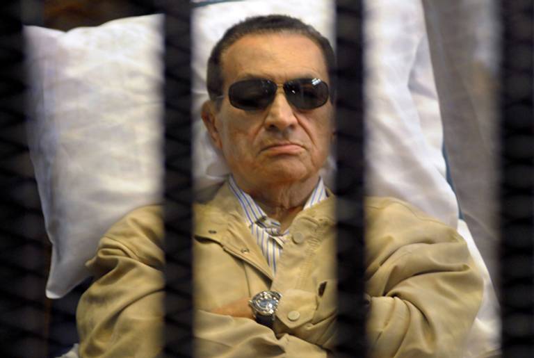Ousted Egyptian president Hosni Mubarak sits inside a cage in a courtroom during his verdict hearing in Cairo on June 2, 2012.(STR/AFP/Getty Images)