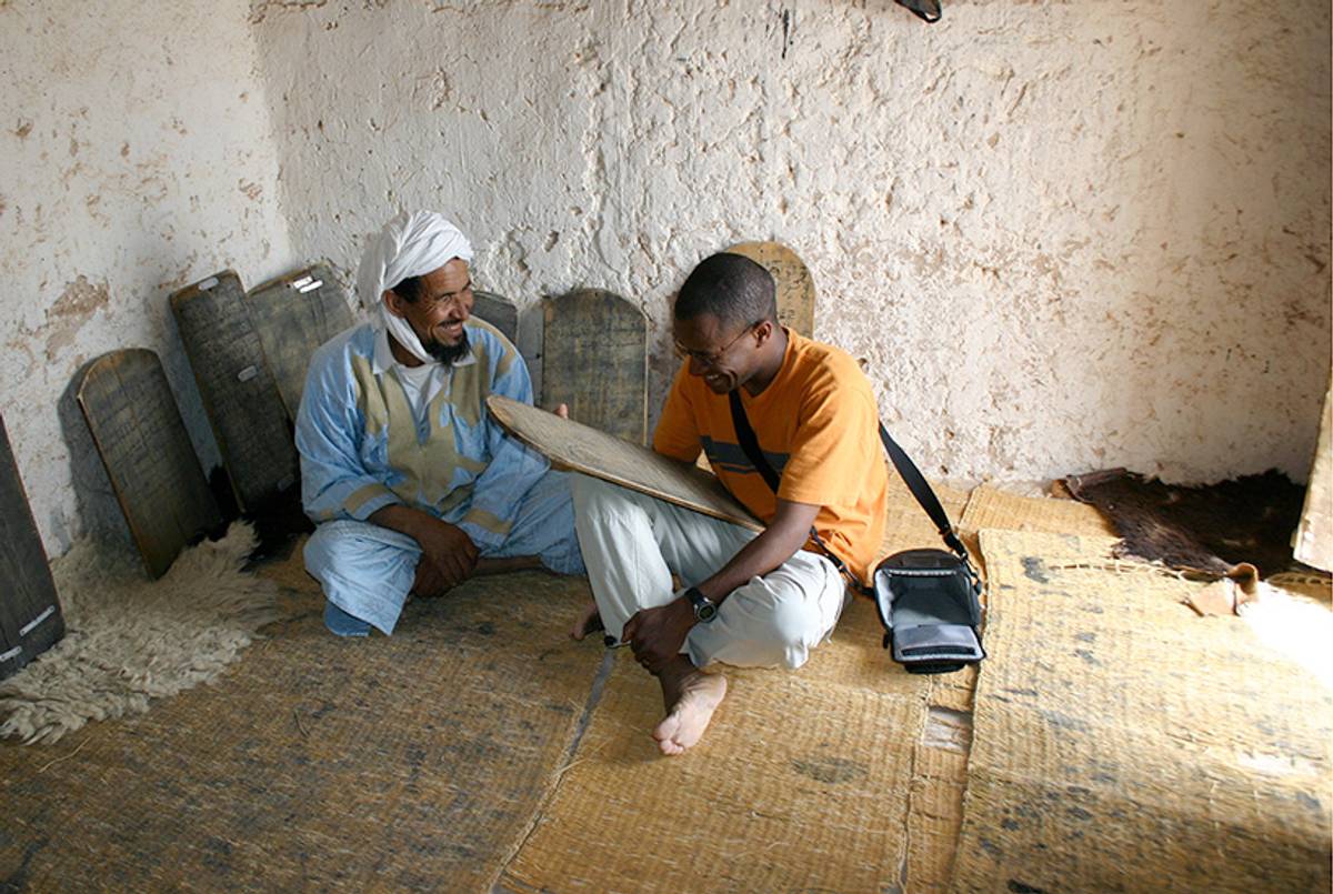 Boum interviews a religious scholar from the generation of parents inside a religious brotherhood and Quranic School. (Courtesy of Aomar Boum)