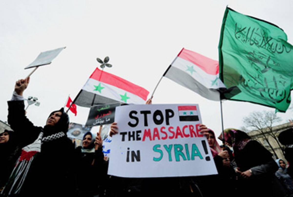 Anti-Assad protesters in Turkey today.(Mustafa Ozer/AFP/Getty Images)