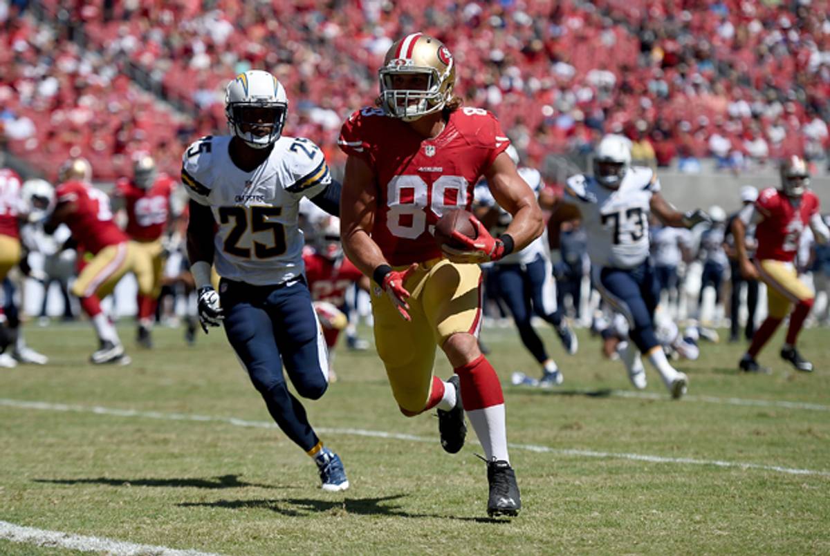 Vance McDonald of the San Francisco 49ers scores a touchdown against the San Diego Chargers during a preseason game on August 24, 2014 in Santa Clara, California. (Thearon W. Henderson/Getty Images)