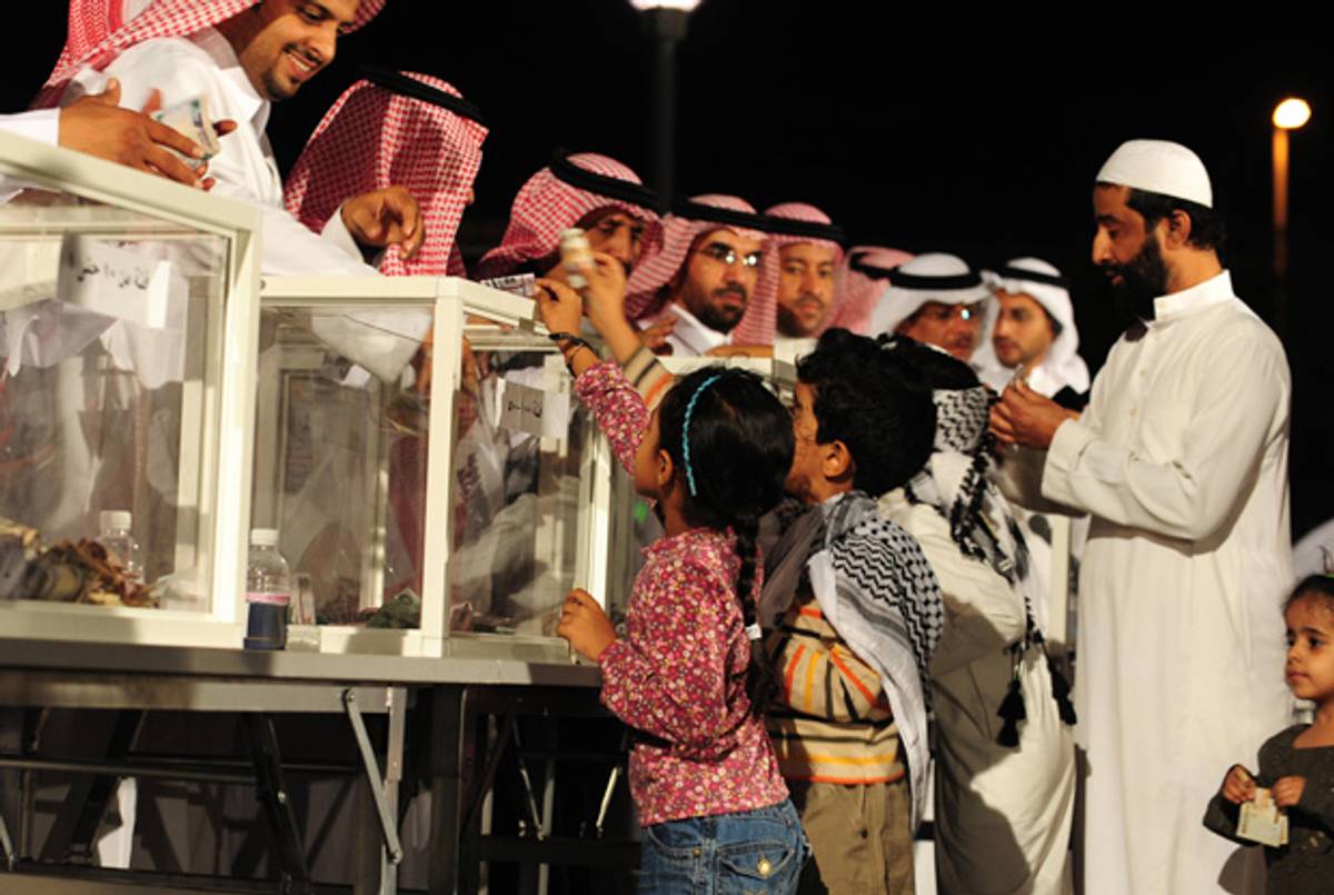Saudi children in Jeddah deposit donations to aid the Palestinians of Gaza, January 2009.(Omar Salem/AFP/Getty Images)