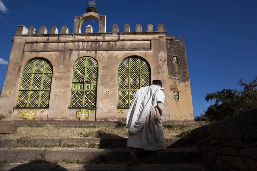 Priest on his way to the St. Mary Church of Zion in Aksum, Ethiopia, on Jan. 25, 2011