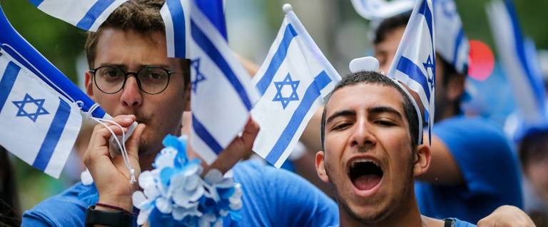 People participate in the annual Celebrate Israel Parade on June 3, 2018 in New York City.