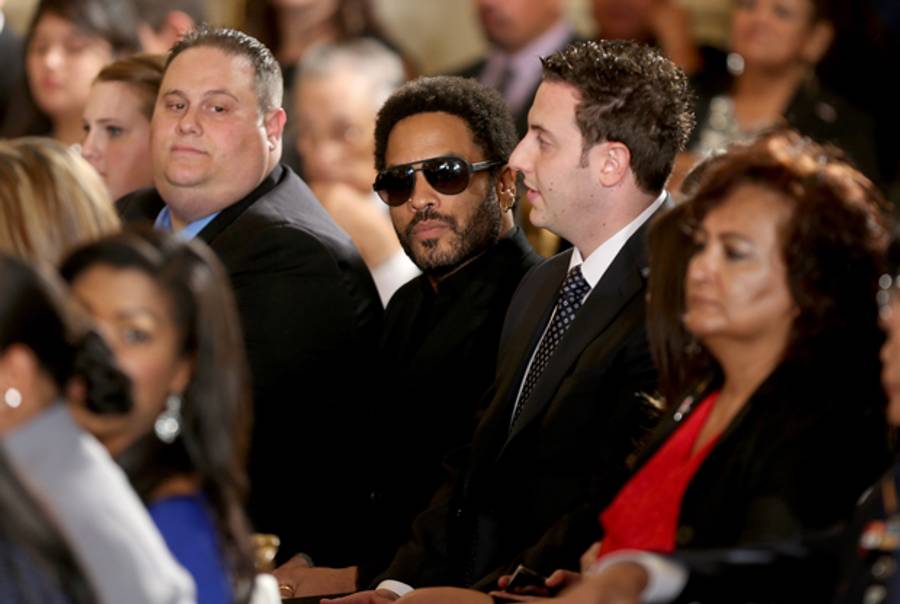 Lenny Kravitz sits in the audience during the Medal of Honor ceremony in the White House on March 18, 2014 in Washington, DC. (Joe Raedle/Getty Images)