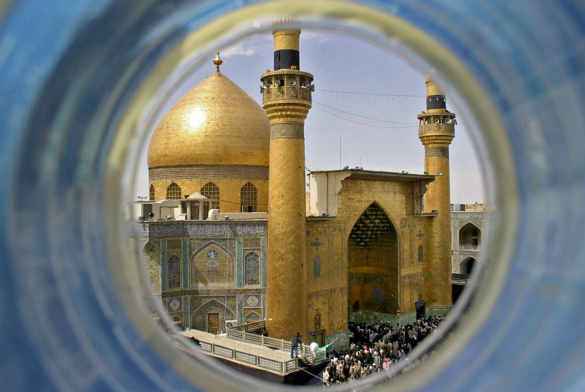 Iraqi Shiite worshipers gather at the golden Shrine of Imam Ali, during a religious ceremony to mark the death of Prophet Mohammed at the holy city of Najaf.(Qassem Zein/AFP/Getty Images)