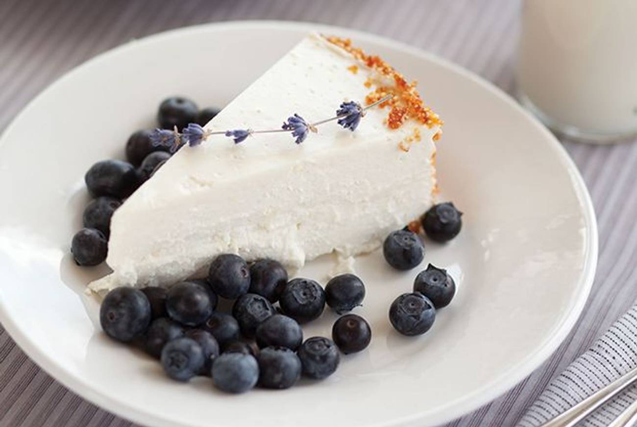 Light and Creamy Cheesecake with Nut Brittle and Blueberries