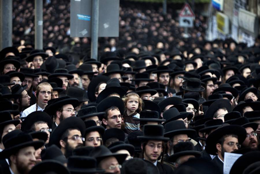 Ultra-Orthodox Jews in Jerusalem on June 25, 2012, at a protest against lifting the law that exempts ultra-Orthodox yeshiva students from mandatory military service. (Menahem Kahana/AFP/Getty Images)