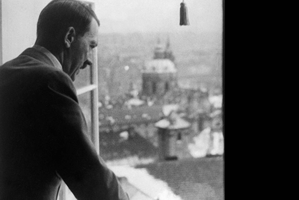 Adolf Hitler looks out from a window of Prague Castle on March 17, 1939. ( -/AFP/Getty Images)