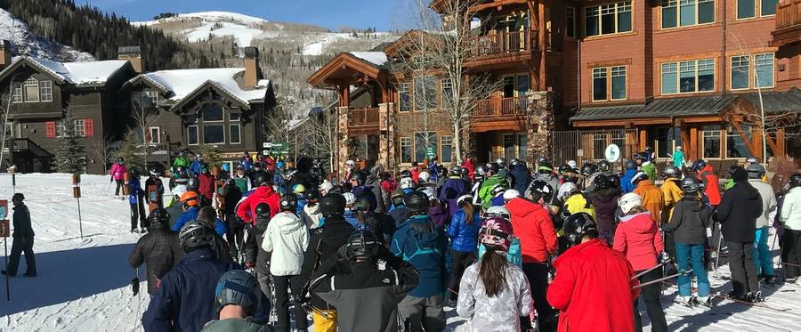 Skiiers wait to board the lift in Deer Valley, Utah