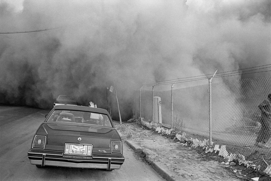 A dust cloud rises during the demolition of a Dodge factory in Hamtramck, Michigan, in 1981