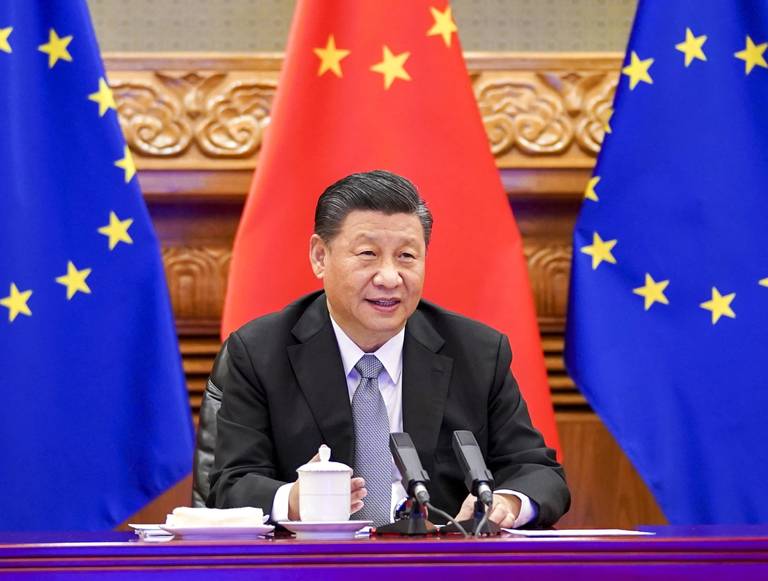 Chinese President Xi Jinping speaks to the leaders of Germany, France, the European Council, and the European Commission via video link in Beijing on Dec. 30, 2020. During the meeting, the Chinese and European leaders announced the EU-China Comprehensive Agreement on Investment (CAI).