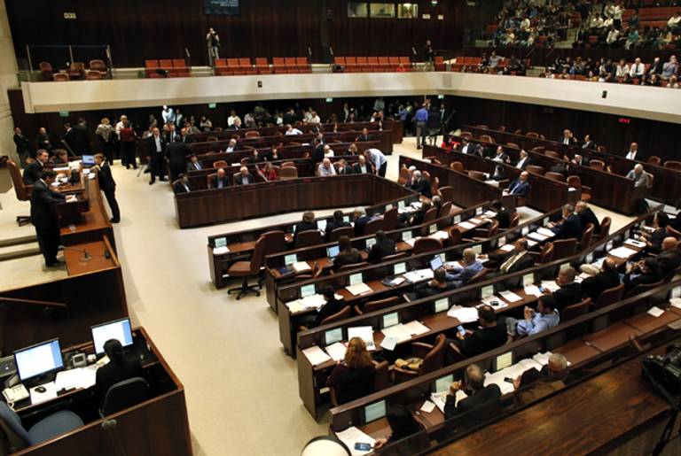 Knesset members pictured during the vote to dissolve the Knesset on December 3, 2014 in Jerusalem. (THOMAS COEX/AFP/Getty Images)