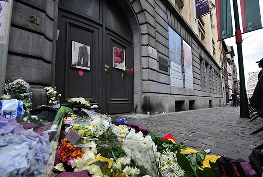 Flowers are pictured at a makeshift memorial at the entrance of the Jewish Museum in Brussels, where a deadly shooting took place May 24, 2014. (GEORGES GOBET/AFP/Getty Images)