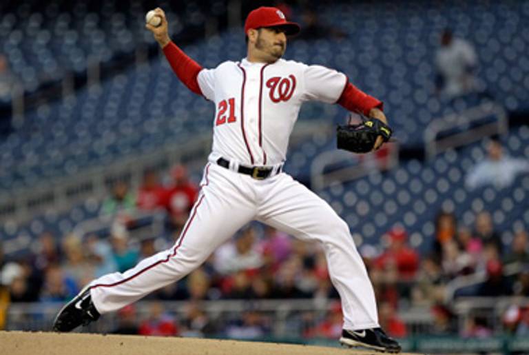 Jason Marquis pitching last month, cheered on by the throngs of Nats fans.(Rob Carr/Getty Images)