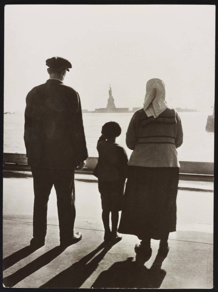An image from 'The U.S. and the Holocaust,' directed by Ken Burns, Lynn Novick, and Sarah Botstein, showing the Statue of Liberty as seen from Ellis Island