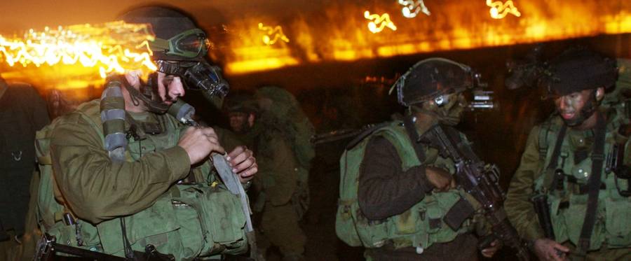 Israel Defense Force troops prepare to mobilize on Jan. 3, 2009, on the Gaza/Israel border.