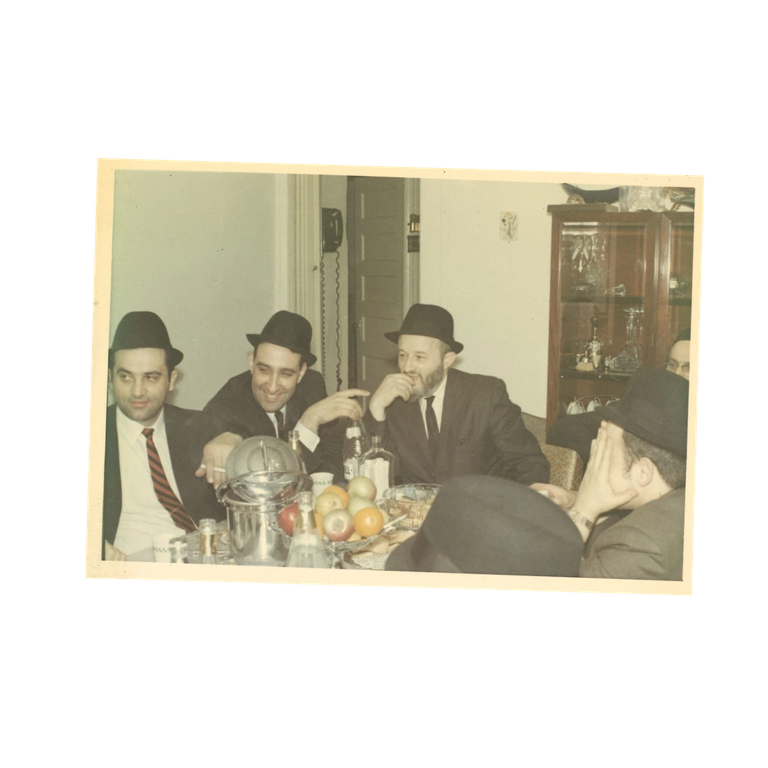 Marvin Schick, second from left, with Rav Yisroel Perkowski, center, Purim night, 1968
