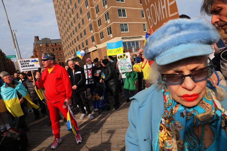 Dmitrii Sorokin, at left, gives a speech as people gather for a rally in support of Ukraine on the Brighton Beach Boardwalk in Brooklyn on March 6, 2022. Hundreds of people assembled in this Russian American neighborhood to show support for Ukraine as the Russian invasion continues.