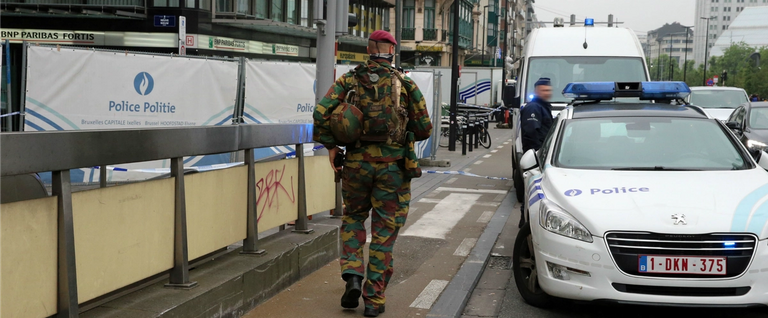 Police and military personnel pictured patrol on the scene of a bomb alert in the City2 shopping mall in the center of Brussels, June 21, 2016. 