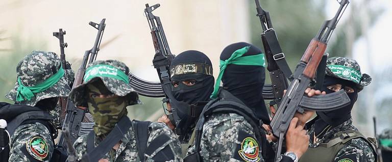 Palestinian militants of the Ezzedine al-Qassam Brigades, Hamas' armed wing, in the center of the Gaza Strip, October 10, 2015. 