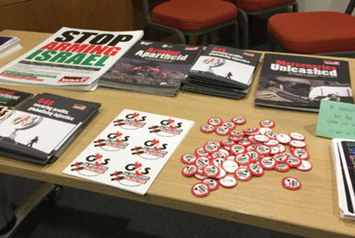 Leaflets and pins advocating the BDS movement stand on display at the Israeli Apartheid Week event at the School of Oriental and African Studies (SOAS) in London. (Photo: Elhanan Miller)