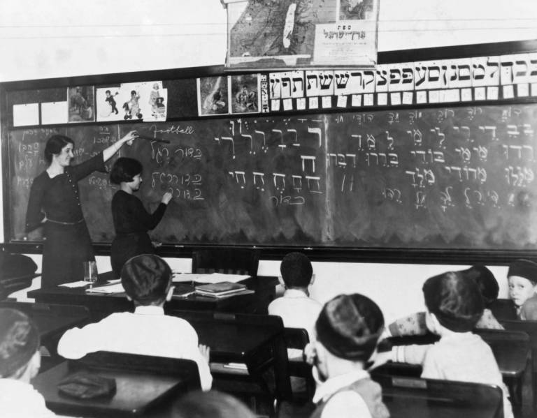 Dorothy Berman teaches Beverly Kauffman in Hebrew at the Jewish Educational Center in St. Paul, Minnesota, 1931