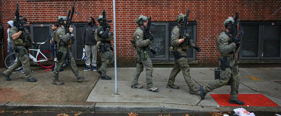 Police officers arrive at the scene of an active shooting in Jersey City, New Jersey, on Dec. 10, 2019