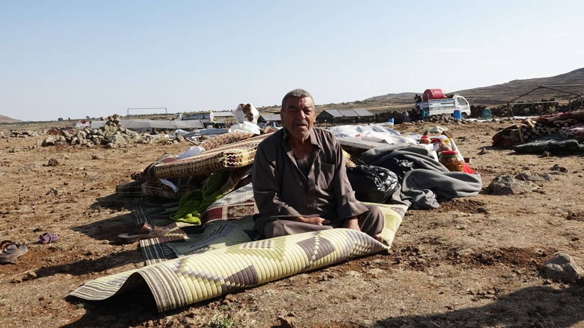 A Syrian refugee lies on the ground in the province of Quneitra, along the Israeli border. (Photo: Jalal)
