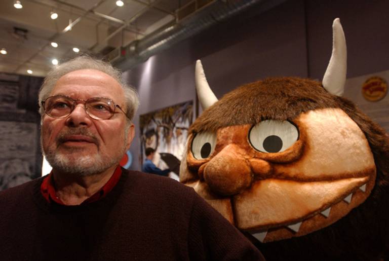 Maurice Sendak with a character from his book, 'Where the Wild Things Are,' on January 11, 2002. (Spencer Platt/Getty Images)
