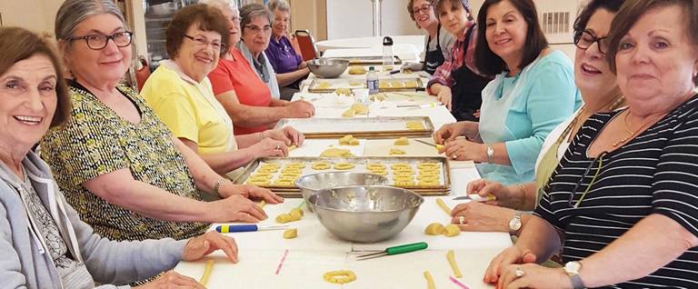 Members of Sephardic Bikur Holim congregation in Seattle make biscochos (slightly sweetened cookies) during one of their weekly baking parties.