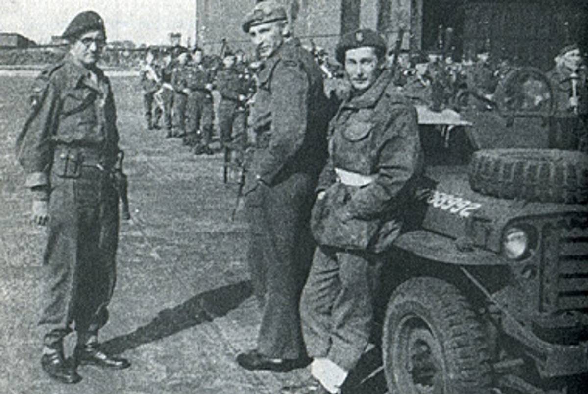 Farran, leaning against the jeep, with other Special Air Service members at a Norwegian airport in 1945.(Photo © John Tonkin)