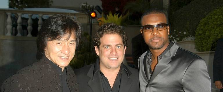 Jackie Chan (L), Brett Ratner, and Chris Tucker (R) in Beverly Hills, California, April 17, 2004. 