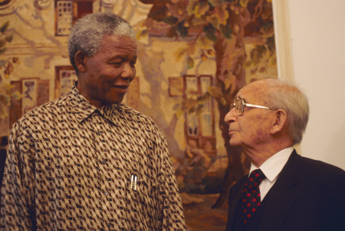President Nelson Mandela talks with Percy Yutar, the prosecutor in the Rivonia treason trial in which Mandela was sentenced to life imprisonment.(Louise Gubb/Corbis Saba)