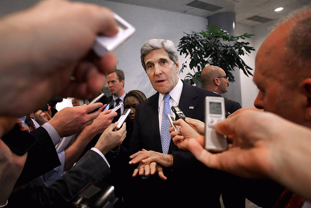 Sec. John Kerry speaks with reporters at the U.S. Capitol on Nov. 13, 2013. Kerry is asking Congress not to approve any new sanctions on Iran while negotiations continue with Tehran about its nuclear program. (Chip Somodevilla/Getty Images)
