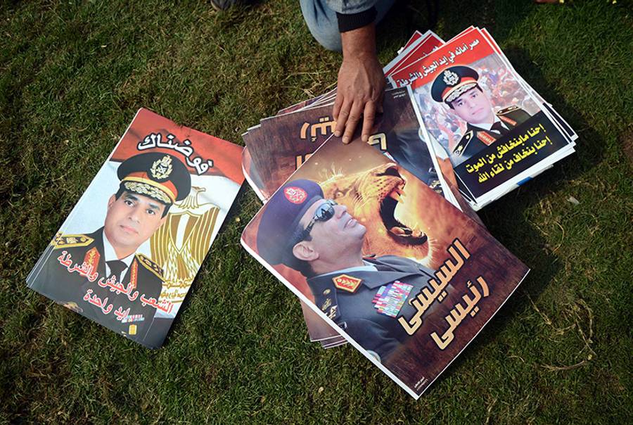 A street vendor in Cairo sell portraits of Egypt's military chief Abdel Fattah al-Sisi on Nov. 19, 2013. (Mohamed El-Shahed/AFP/Getty Images)
