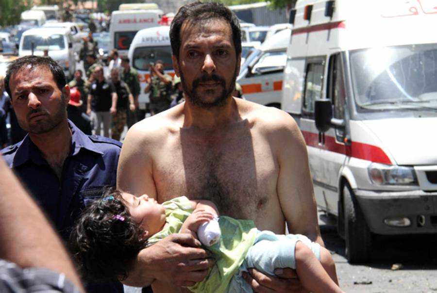 This girl was actually wounded in an attack on security services, in Damascus.(-/AFP/GettyImages)