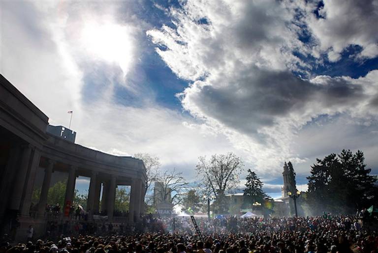 A hazy cloud rises over thousands gathered in Civic Center Park in Denver to celebrate the state's medicinal marijuana laws in 2012.(Getty)