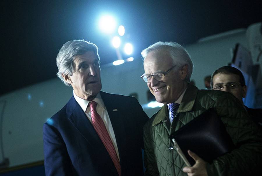 U.S. Secretary of State John Kerry and U.S. Special Envoy for Israeli-Palestinian Negotiations Martin Indyk return from a day trip to Jordan and Saudi Arabia at Ben Gurion International Airport on Jan. 5, 2014.(Brendan Smialowski/AFP/Getty Images)