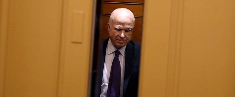 John McCain takes an elevator to the U.S. Capitol on July 26, 2017, in Washington, D.C.