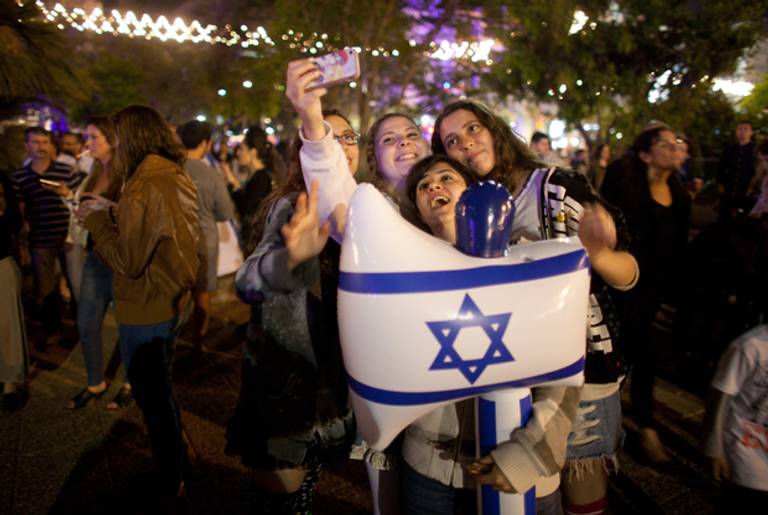 Israelis celebrate the Jewish state's 65th Independence Day on April 15, 2013 in Tel Aviv, Israel. (Uriel Sinai/Getty Images)