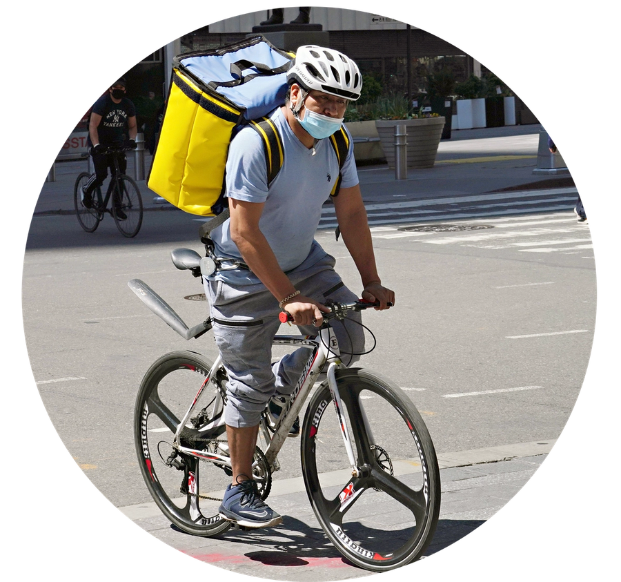 A delivery person wearing a protective mask in New York City on May 21, 2020 